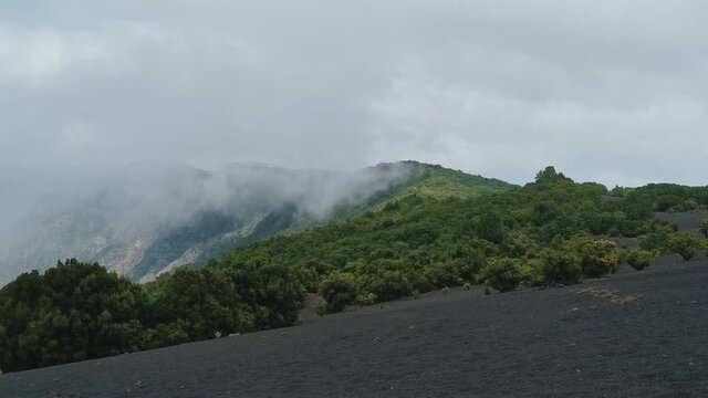 Landscape. Sea of clouds crossing the top of El Hierro island. Canary islands. Spain