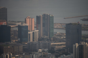 Naklejka premium Hong Kong Victoria harbor city landscape, business downtown urban with skyline building tower, Asia district scene of skyscraper architecture view to travel