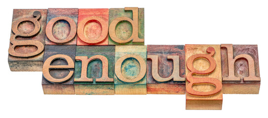 Good enough - word abstract in vintage letterpress wood type, self confidence, satisfaction and...
