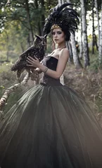 Wandcirkels aluminium beautiful woman with owl in the nature © konradbak