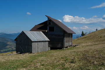 Wooden house and shed in the mountains