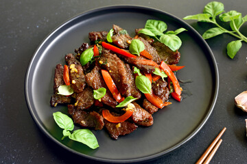 Thai beef stir-fry with pepper and basil