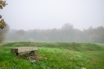 Close up spider web with water drops on a fence during autumn in London