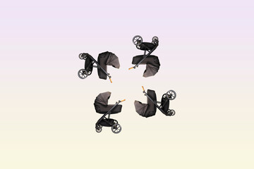 Four baby strollers on a grey background