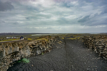Reykjanes Peninsula, Iceland: The rift between the  European and North American tectonic plates, with the North Atlantic Ocean in the background.
