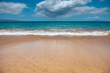 Sea background, nature of tropical summer beach with rays of sun light. Sand beach, sea water with copy space, summer vacation concept.