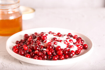 fresh cranberries with sugar are on the table