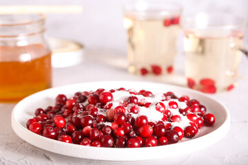fresh cranberries with sugar are on the table