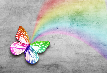 Obraz na płótnie Canvas Abstract grunge grey concrete background with colorful rainbow butterfly.
