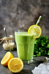 Healthy smoothie with cucumber, parsley, oatmeal and lemon juice.

