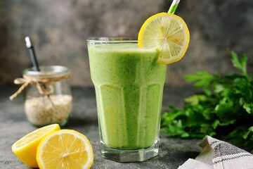 Healthy smoothie with cucumber, parsley, oatmeal and lemon juice.
