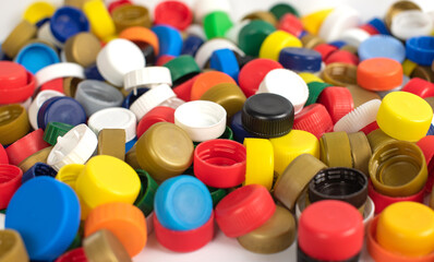 Fototapeta na wymiar Colorful plastic bottle screw caps used to seal plastic bottles