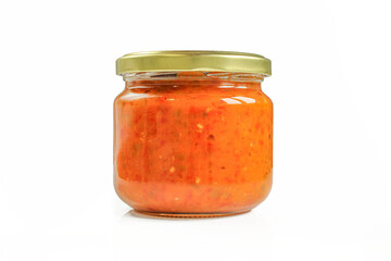 Balkans delicacy Ayvar or Ajvar in glassy jar isolated on white background. Traditional homemade product