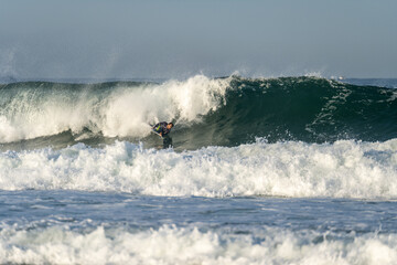Bodyboarder riding a wave