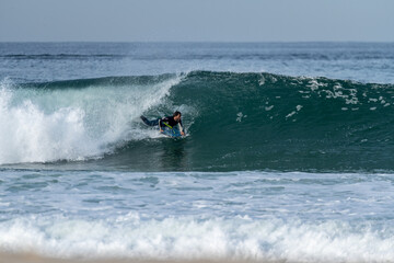 Bodyboarder riding a wave