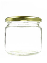 Empty glass jar with metallic cap isolated on white background