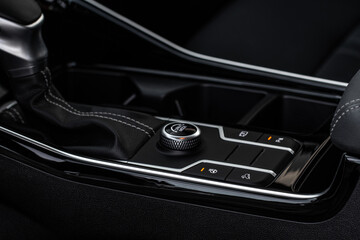 Drive selector button. Automatic gear lever and gear shift. Car interior, offroad drive controller...