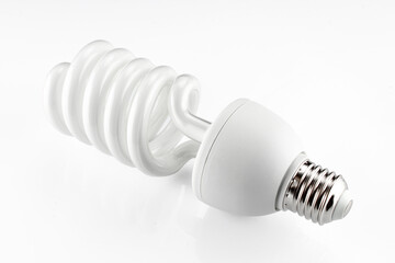 Spiral LED energy-saving light bulb isolated on white background