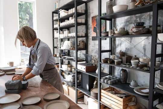 Female Potter Kneading Clay