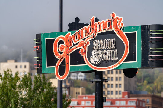 Duluth, Minnesota - October 6, 2021: Sign for Grandma's Saloon and Grill, an iconic and famous chain of restaurants in the Canal Park area