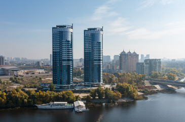 Fototapeta na wymiar Air view of the houses on the banks of the Dnieper River. Residential complex