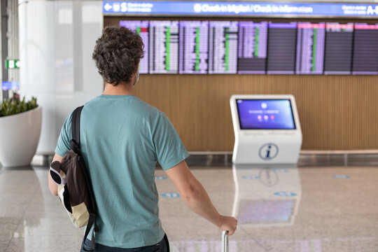  passenger waiting in airport departure terminal