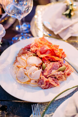meat platter slicing sausages salami holiday party