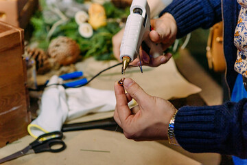process making Christmas wreath pine needles gluing