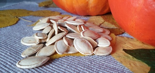 Pumpkin and pumpkin seeds. Pumpkin seeds.
Autumn harvest of pumpkins. Vitamins and minerals, diet,...