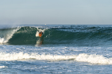 Bodyboarder riding a wave