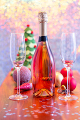 New year decoration with champagne and two flute glasses.