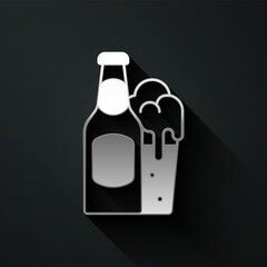 Silver Beer bottle and glass icon isolated on black background. Alcohol Drink symbol. Long shadow style. Vector