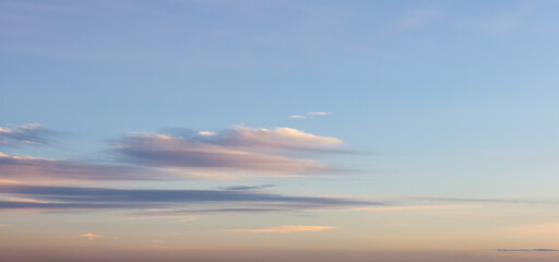 Obraz premium View of colorful cloudscape during vibrant summer sunset on the ocean coast. Taken in Vancouver, British Columbia, Canada. Nature Background