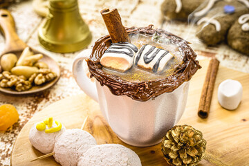 Fototapeta na wymiar cup of vegan hot chocolate made with vegetable milk, Christmas drink with smoky steam