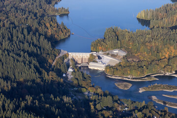 Aerial view from airplane of a water dam by Hayward Lake. Taken near Mission, East of Vancouver,...