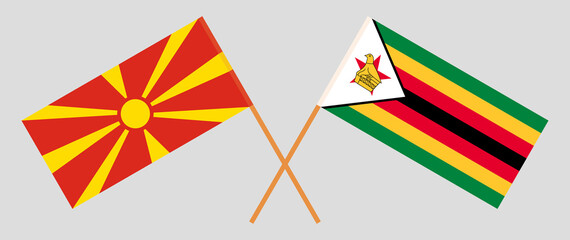 Crossed flags of North Macedonia and Zimbabwe. Official colors. Correct proportion