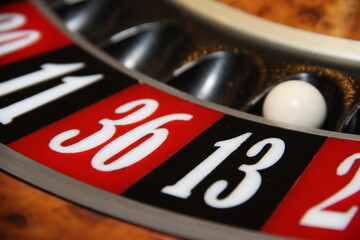 Roulette game. Black on 13. Number 13. Casino. To bet. Betting game. Luck. Ball in number thirteen....