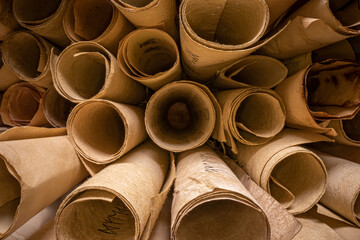 Vintage scribe library. Retro futhpak scrolls stacked on a pile.