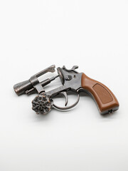 A metal pistol. A child's toy for playing war..