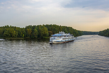 White double-deck ship Bashkortostan on a cruise on the Volga River. Built in Hungary in 1962. Yaroslavl Region, Russia