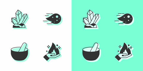 Set Hand holding fire, Magic stone, Witch cauldron and Fireball icon. Vector