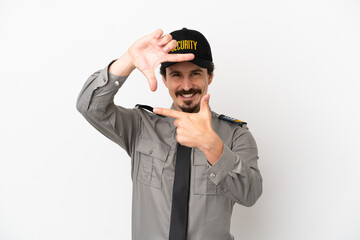 Young caucasian security man isolated on white background focusing face. Framing symbol