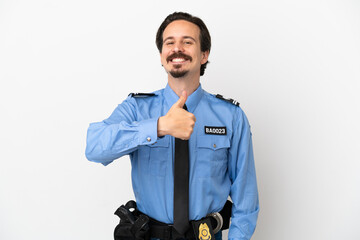 Fototapeta premium Young police man over isolated background white giving a thumbs up gesture