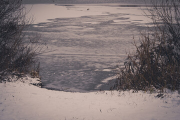 The first ice on a pond, river, lake.