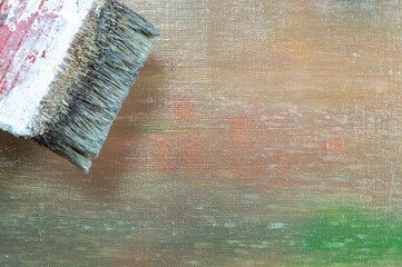 abstract colored creative background - rough linen canvas unevenly covered with multi-colored...