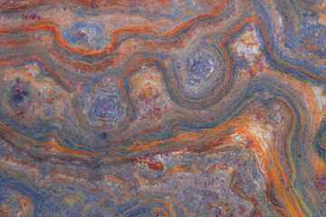 grunge background: curly rust on an old metal surface, toning