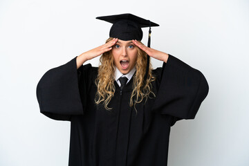 Young university graduate isolated on white background with surprise expression