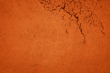fond abstrait orange de craquelures de peinture.