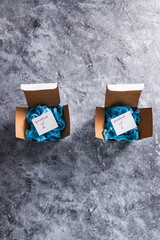 online delivery parcel boxes with Product 1 and 2 on tags, competitions and customer choices