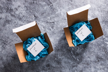 online delivery parcel boxes with Product 1 and 2 on tags, competitions and customer choices